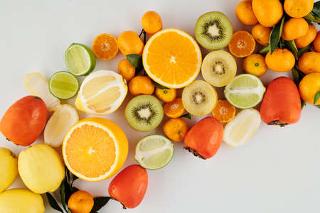Juicy green and orange fruitsの写真素材