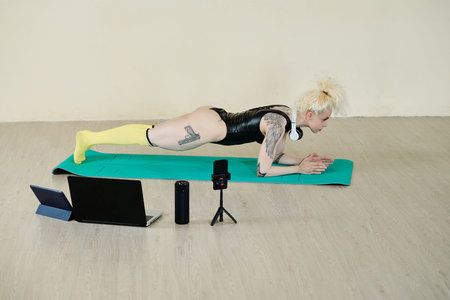 Fit woman in plank positionの写真素材