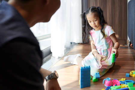 Girl playing with daughterの写真素材