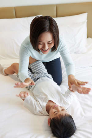 Playing hand clapping gameの写真素材