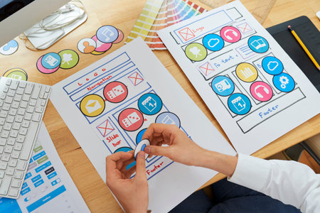 UX designer working on set of icons for new mobile application