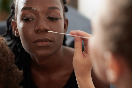 Woman using swab stickの写真素材