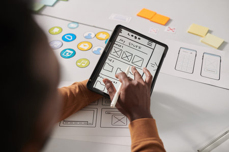 UX drawing sketch of new mobile app interface on tablet computer