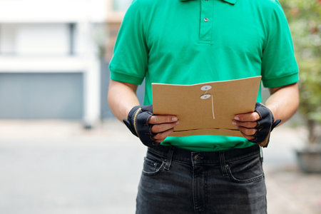 Courier delivering envelope with important document