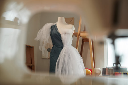 Mannequin with draped fabric in studio of fashion designerの写真素材