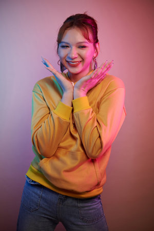 Portrait of joyful young transgender woman