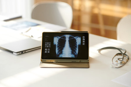 Tablet computer with lungs x-ray image on screen of tablet computer