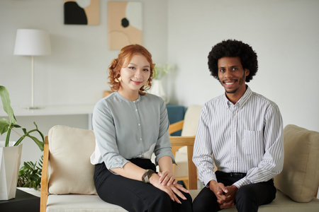 Portrait of happy woman sitting next to her psychotherapist, mental health conceptの写真素材