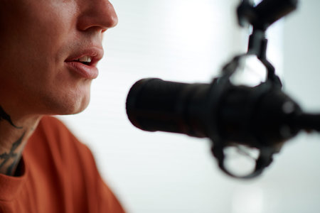 Radio host speaking in microphone when recording show