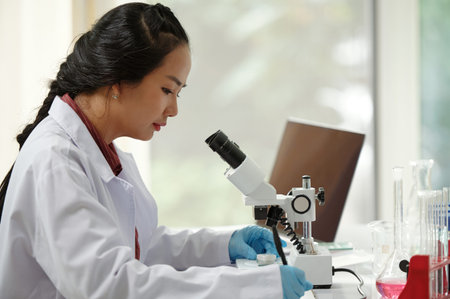 Scientist working on new medical solution in clinic laboratory