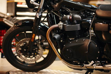 Cropped image of motorcycle in modern garage of repairmanの写真素材