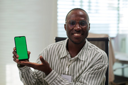 Bank manager calling client to discuss details of mortgage loanの写真素材