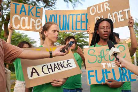 Zoomers demanding to take care of planet when protesting on Earth dayの写真素材