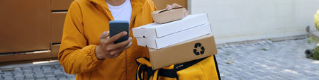 Web banner with delivery man checking address of customer via mobile application