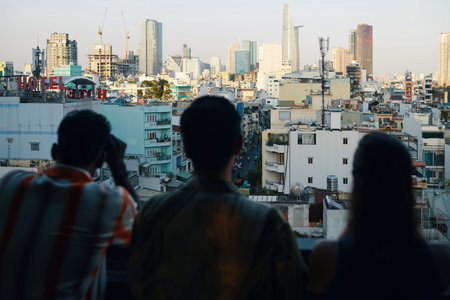 People enjoying big city view, view from behindの写真素材