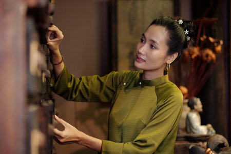 Apothecary Worker Opening Drawer To Take Out Main Ingredientの写真素材