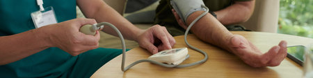 Doctor Measuring Pressure To Patient