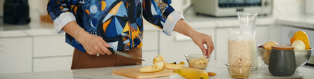 Woman Preparing Bananas For Breakfast