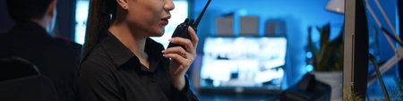 Woman Talking By Radio In Security Post