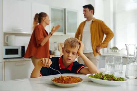 Child Listening To Quarrel Of His Parentsの写真素材