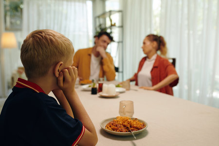 Son Watching For Quarrel Of His Parentsの写真素材