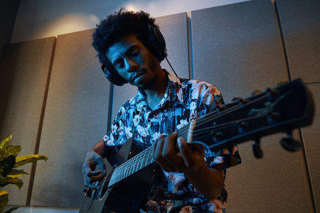 Man Playing Song On Guitar