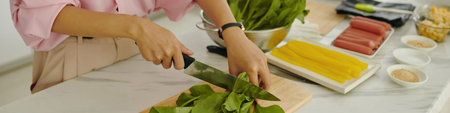 Woman Cutting Greens For Vegetable Salad