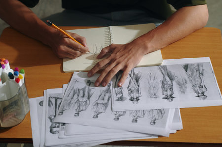 Designer Drawing New Fashion Collection