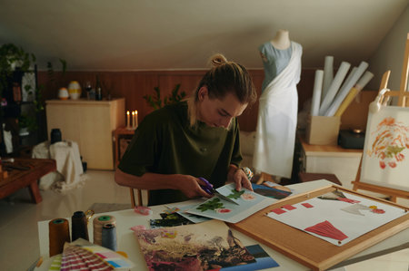 Designer Making Collage From Photosの写真素材