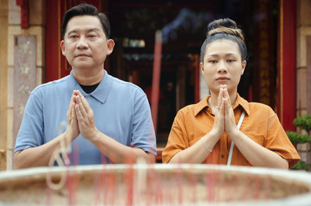 Asian Couple Meditating In The Templeの写真素材