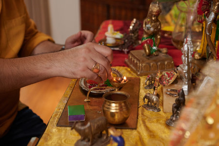 Man Lightning Candles At Altar