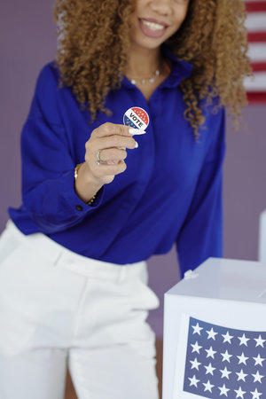 Woman With Patriotic Badge Voting