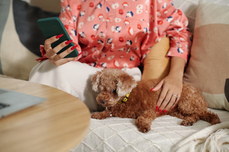 Woman Typing Message On Her Smartphoneの写真素材