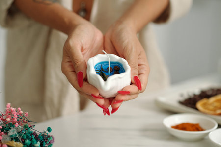 Woman Making Handmade Aroma Candleの写真素材