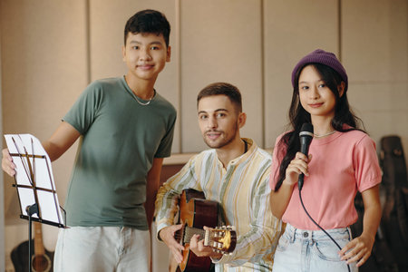 Group of Diverse Friends Enjoying Jam Session Together