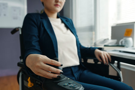Woman With Disability Using Modern Wheelchairの写真素材