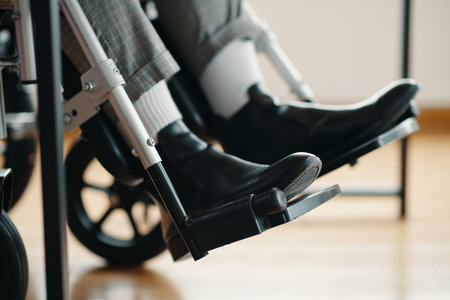 Businesswoman Sitting In Wheelchairの写真素材