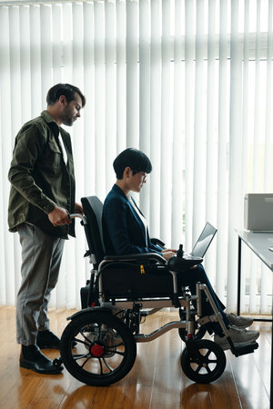 Businesswoman With Disability Working In Officeの写真素材