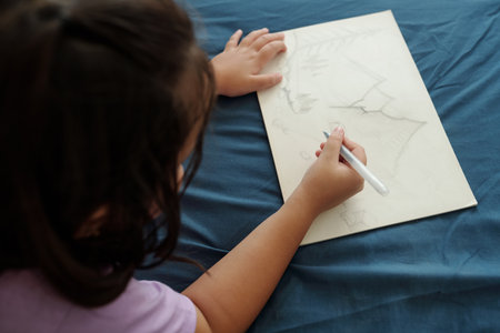 Girl Drawing Picture At Leisure Timeの写真素材