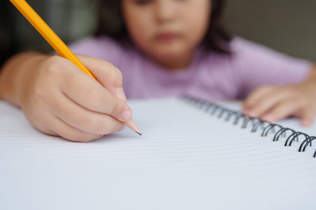 Girl Making Notes In Notebookの写真素材
