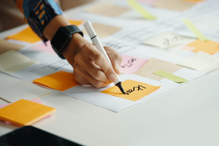 Unrecognizable Female Hand Writing Notes