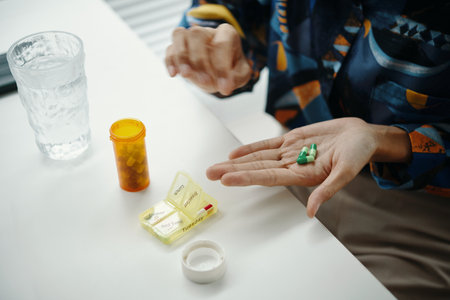 Unrecognizable Woman With Medications In Handの写真素材