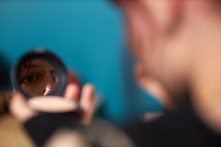 Unrecognizable Girl Looking Into Mirrorの写真素材