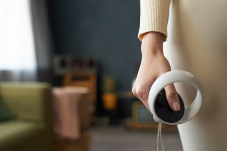 Holding Virtual Reality Controller in Living Room Setting