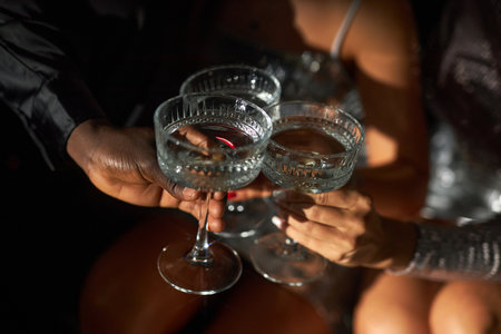 Sharing Drinks in Celebration with Friendsの写真素材