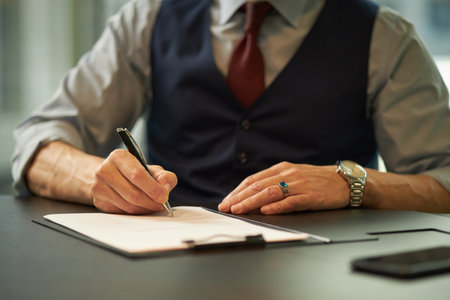 Hands Of Businessman Signing Contractの写真素材