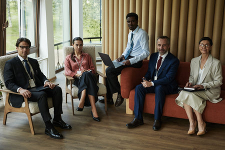 Group of diverse business professionals including Caucasian man, woman, Black man, young and middle...