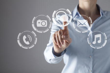 Businesswoman in front of visual touch screen.の写真素材