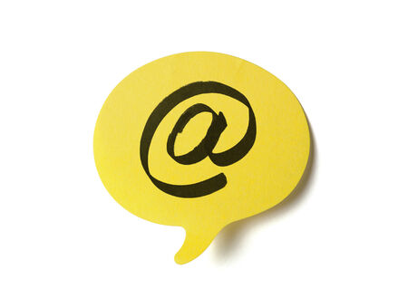 Yellow sticker with shape of speech bubble, clipping path includedの写真素材