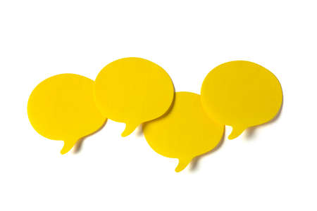 Yellow stickers with shape of speech bubble, clipping path includedの写真素材